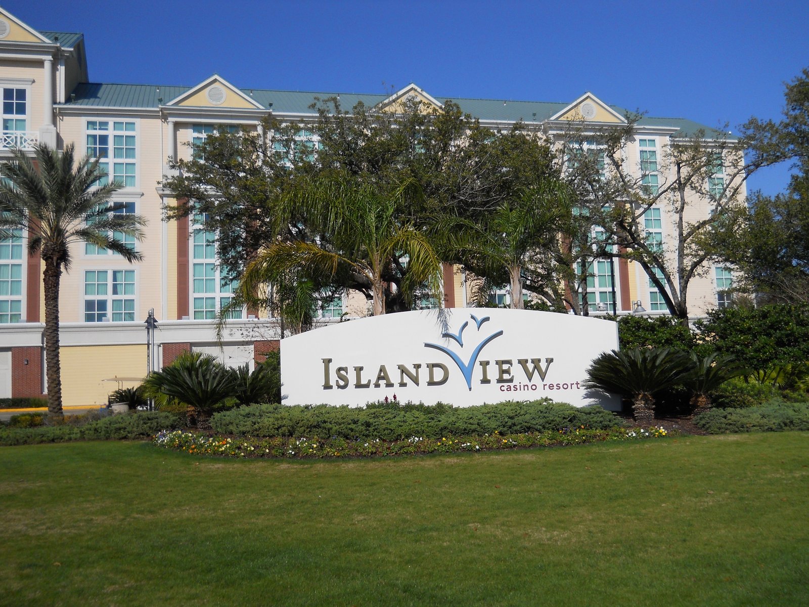 The Island View Casino Resort entrance sign with the hotel tower behind it in Gulfport