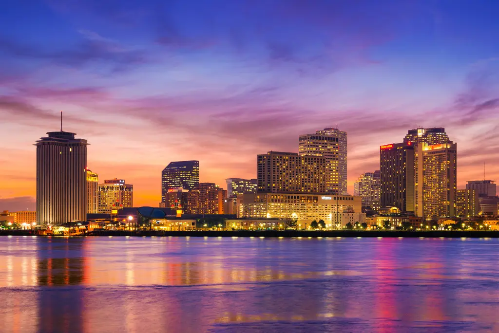 The New Orleans skyline along the Mississippi River at sunset